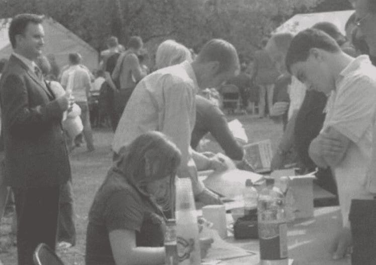 Arthur Kemp (left) supervises registration at BNP Summer camp 2007